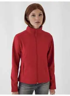 Externa: 96% poliéster, 4% elastán. Interior: 100% poliéster micro-polar. Chaqueta softshell en tejido impermeable y transpirable, cuello reforzado. Corte femenino ergonómico slim-fit, forro en microfibra anti-pilling en un color en contrasto, 2 bolsillos delanteros con cremallera y dos bolsillos.