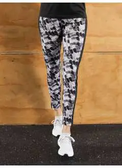 90% poliammide, 10% elastan. Leggings sportivi, tessuto morbido e elastico con elastan, stampa all-over, inserti a un colore sui lati, girovita elastico con cordino, taschino porta chiavi con zip.