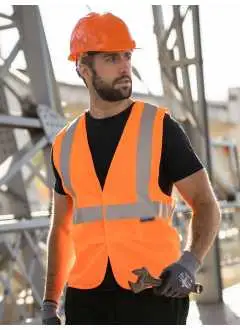 100% poliéster. Chaleco sin mangas de seguridad, con 3 bandas reflectantes. Certificado a la norma EN ISO 20471:2013 + A1:2016, Oeko-Tex® Standard 100, color naranja conforme a la norma GO/RT 3279. Una banda reflentante ancha 5 cm alrededor del cuerpo y otras dos bandas perpendiculares en los hombros. Medida ajustable gracias a su doble cierre de velcro. Confeccionado singularmente en una bolsa de polietileno.