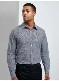 100% tela de hilo de algodón. Camisa manga larga hombre, puños con 2 botones cada uno, medium fit.