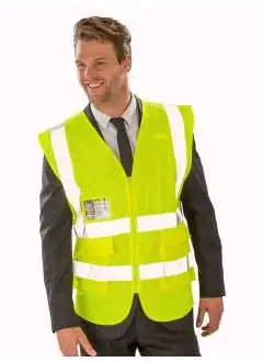 100% polyester mesh. Gilet de sécurité en mesh, ourlets de couleur contrastée, bandes réfléchissantes cousues (50 mm). Tissu en mesh pour une meilleure respiration. Poches avec fermeture par velcro, poche porte-badge, fermeture par zip. EN ISO 2013+A1:2016 Class 2 / RIS-3279-TOM (orange). Lavable à 40°C.