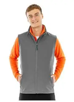 100% poliestere riciclato TOPGREEN®. Interno: 100% poliestere riciclato micropile. Gilet in softshell stampabile con colletto alto, taglio attillato, zip YKK NATULON® Eco-Friendly.