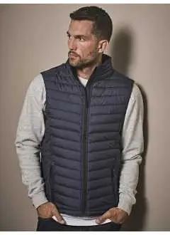 100% rembourrage et doublure polyester 300T. Sans manches, 2 grandes poches avant, poche intérieure, fermeture éclair intérieure pour la décoration, hydrofuge